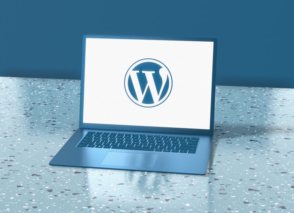 WordPress logo on laptop screen